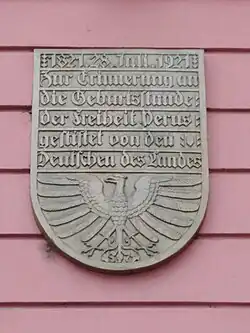 The tower's plaque in German