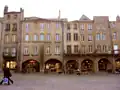 The Saint-Louis square with its vaulted gallery and arches was the site for money changers and the Lombards.
