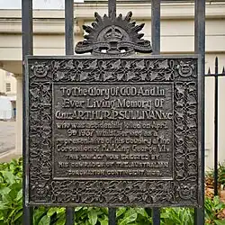 a photograph of a brass plaque
