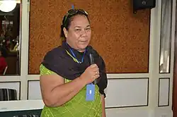 Pulafagu Toafa holds a microphone