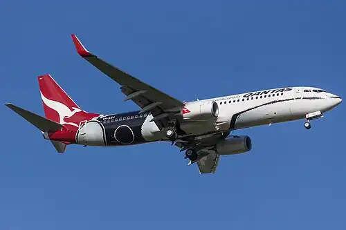 A Boeing 737–800 in 2015 wearing the Mendoowoorrji livery, Inspired by the work of the late West Australian Gija painter Paddy Bedford's 2005 painting 'Medicine Pocket'. The aircraft has carried the colour scheme since 2013.