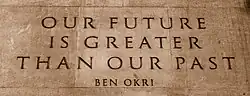 The quote by Ben Okri engraved on the gates
