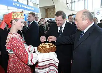 Russian Prime Minister Mikhail Fradkov and his Belarussian counterpart Sergei Sidorsky (from right to left) at the opening of a Russian national exposition underway in Minsk as part of the first Russian-Belarussian economic forum.