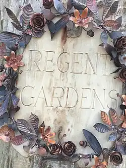 Sign by the west entrance to Regent Gardens