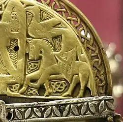 Rider and bird on the right-hand side of the Corp Naommh's cap