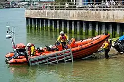 Rennee Sherman (B-891) being launched in a cradle in the river Arun, Littlehampton Lifeboat Station, 9 May 2016.
