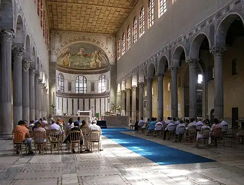 The Constantinian basilica of Santa Sabina interior, with spolia Corinthian columns from the Temple of Juno Regina