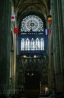 Interior of the south transept, with rose window