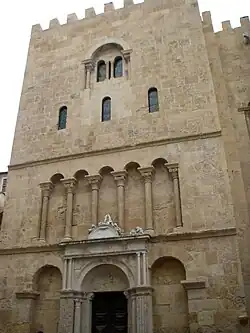 Its northern facade with narrow windows and columns.