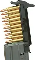 M-16 / AR-15 StripLULA rifle magazine loader and unloader.