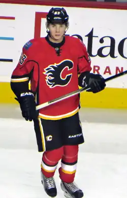 Bennett stares down the ice during pre-game warm-up prior to a Flames exhibition game.