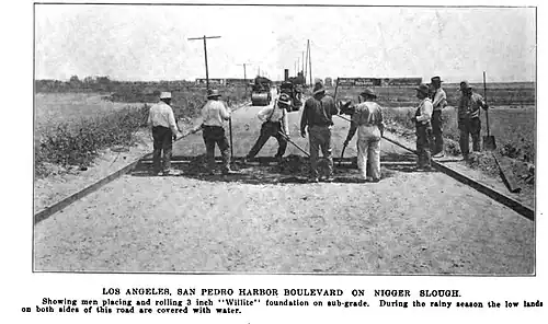 Paving "San Pedro Harbor Boulevard" through the slough, June 1919