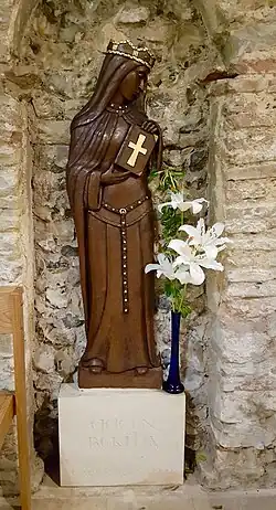 St Bertha wooden statue, south wall of the church