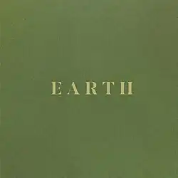 A green background with "EARTH" in green