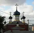 The onion domes of Saint Spiridon Orthodox Cathedral, built in 1941 in Cascade, evoke the churches of northern Russia.