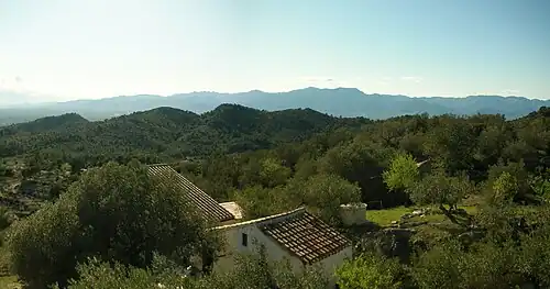 Serra de Collredó seen from the east. In the background the Ports de Beseit