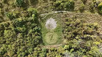 Shiny 7th badge on the hillside (August 2025, in a state where scouring is required)