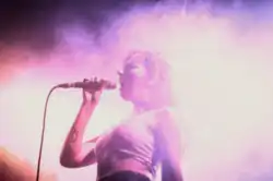 Singer Catarina Miranda performing live with :papercutz during King Ruiner European Tour 2019.