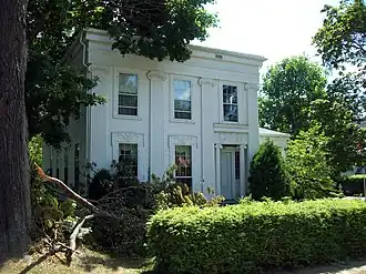 The Smith Bly House in New York state featuring Ionic pilasters, 1835.