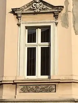 Detail of cartouche (design) and pediment