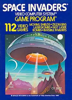 Portrait-oriented artwork featuring three alien flying saucers against a mountainous landscape. At the top are the words: "Space Invaders Video Computer System Game Program. 112 video games: moving shields, zigzagging, laser bombs, fast laser bombs, invisible invaders"