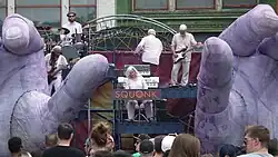 Squonk performing Hand to Hand in 2023 at the Three Rivers Arts Festival, Pittsburgh