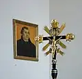 Processional crucifix with the portrait of Martin Luther at Saint George's Lutheran church in Immeldorf, Lichtenau