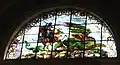 South lunette stained-glass window of St. George slaying the dragon, (1883–84) by Forrest and Sons of Liverpool