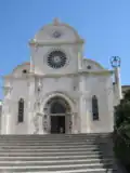 The facade of the cathedral, with the rose window and portal
