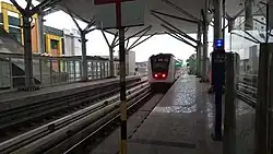 Train departing from Boulevard Selatan LRT station to Pegangsaan Dua