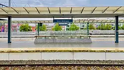 Place name sign on a platform