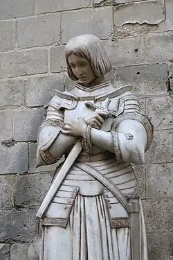 Statue of Joan of Arc outside the church