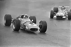 Jackie Stewart being chased by Jochen Rindt at the 1968 Dutch Grand Prix.