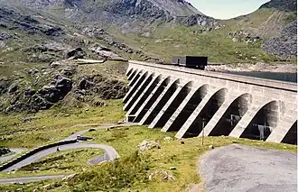 The upper reservoir and dam of the Ffestiniog Pumped Storage Scheme in Wales. The lower power station can generate 360 MW of electricity.