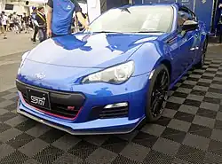 Subaru BRZ tS, a high-performance variant of the standard Subaru BRZ coupe. This photo shows the front of the car, which is blue with a small "tS" emblem on the front grille, which stands for "tuned by Subaru".