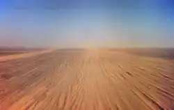 The main road Algiers - Tamanrasset on the Tademait plateau, not yet paved in 1973