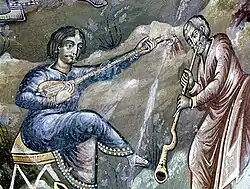 11th century A.D., Byzantium. Tambouras and fingerhole trumpet.