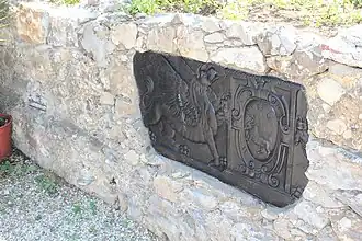 Stone terrace with decorative reliefs and sea view