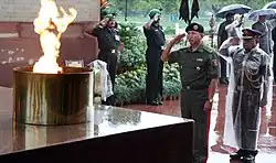 Foreign dignitaries: Kyrgyzstan Defence Minister, Major General Abibilla Kudayberdiev rendering a hand salute, 2011