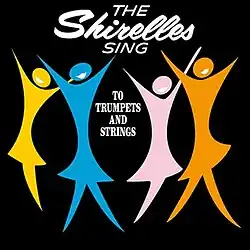 A simple line drawing of colorful women with their hands raised, smiling on a black background