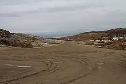 Threshold of runway 34 (now 33)