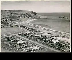 Rapid Bay, South Australia in 1950 with its limestone quarry and jetty for loading limestone onto ships