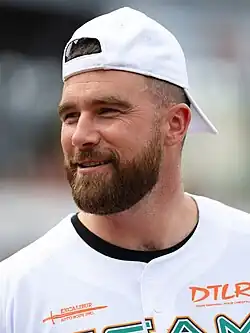 Kelce smiling at a camera