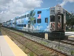 Tri-Rail cab car 501 departing Deerfield Beach