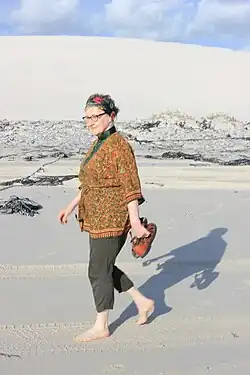 Trienke Laurie walking on the beach