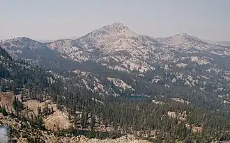 Aerial photo of Trinity Mountain surrounded in smoke