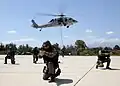 Turkish SAT commandos perform fast-rope exercises from a U.S. Navy MH-60S Sea Hawk helicopter during exercise Phoenix Express 2009.
