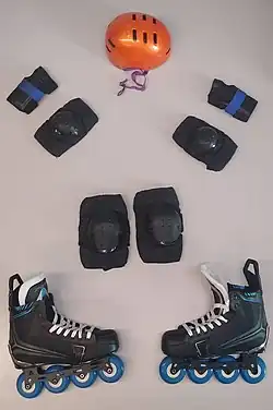 Typical In-line skating protective gear includes helmet, elbow pads, wrist guards, and knee pads.