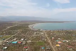 Aerial view of Divilacan after Typhoon Megi (Juan) in October 2010
