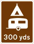 Camping and caravan site 300 yd (270 m) ahead